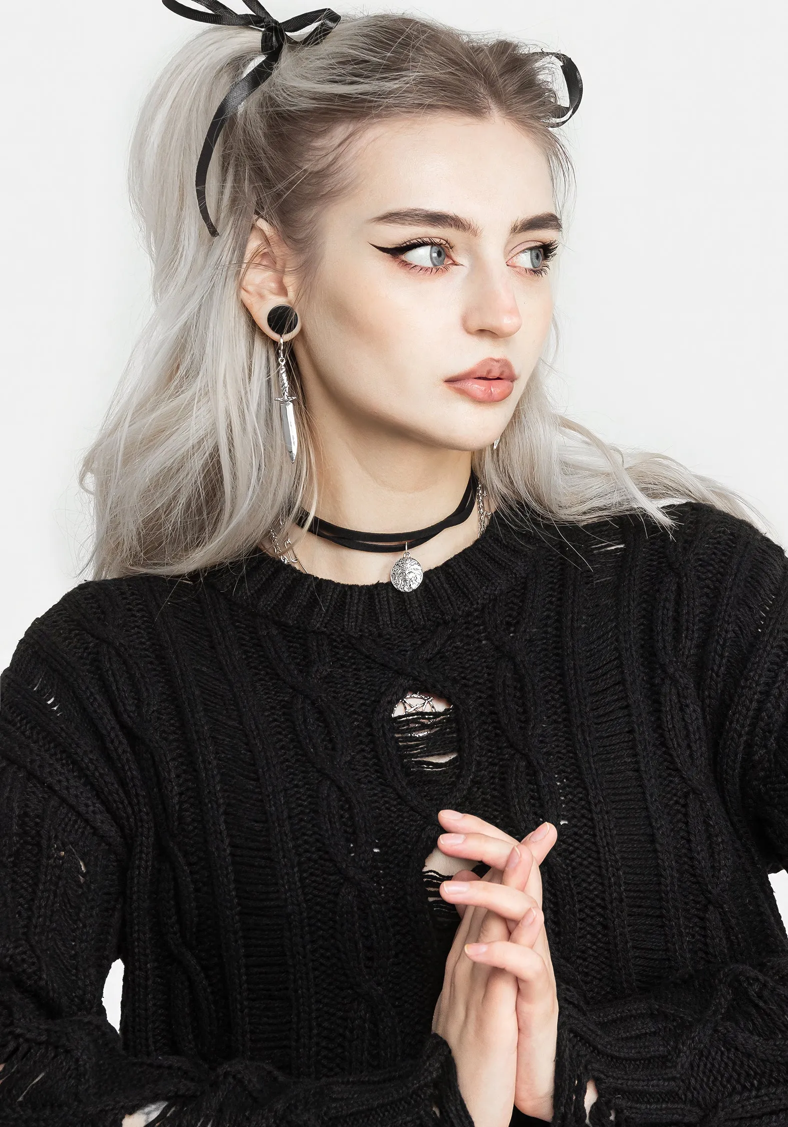 Nemesis Distressed Cable Knit Sweater