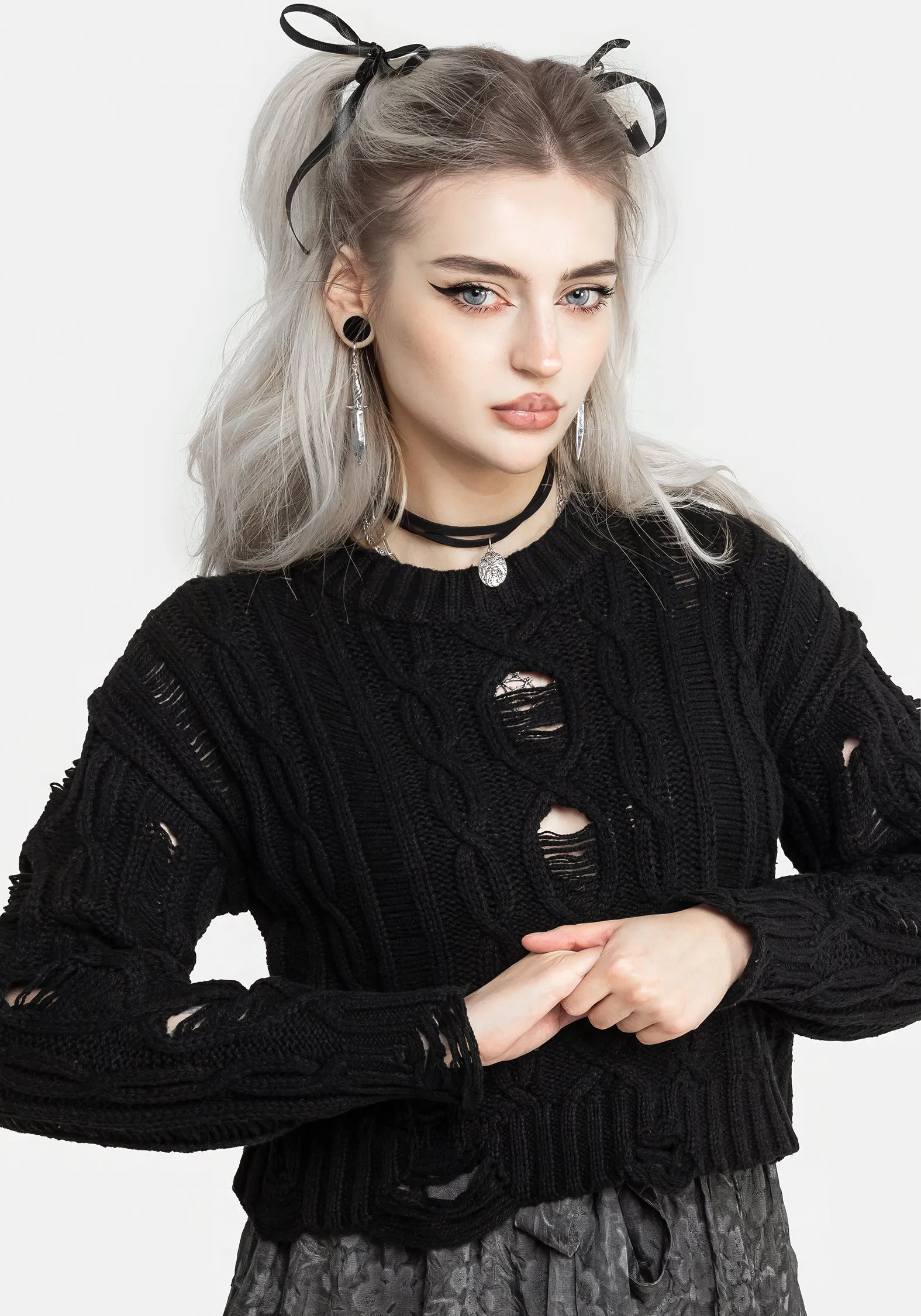 Nemesis Distressed Cable Knit Sweater